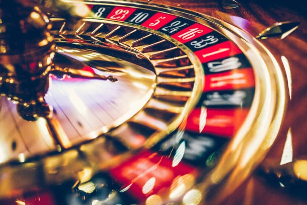 Wild West Gold game interface displayed on mobile phone screen with reels and controls